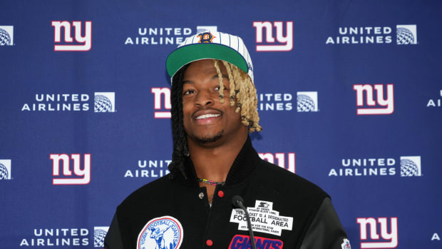 Xavier McKinney at a press conference.